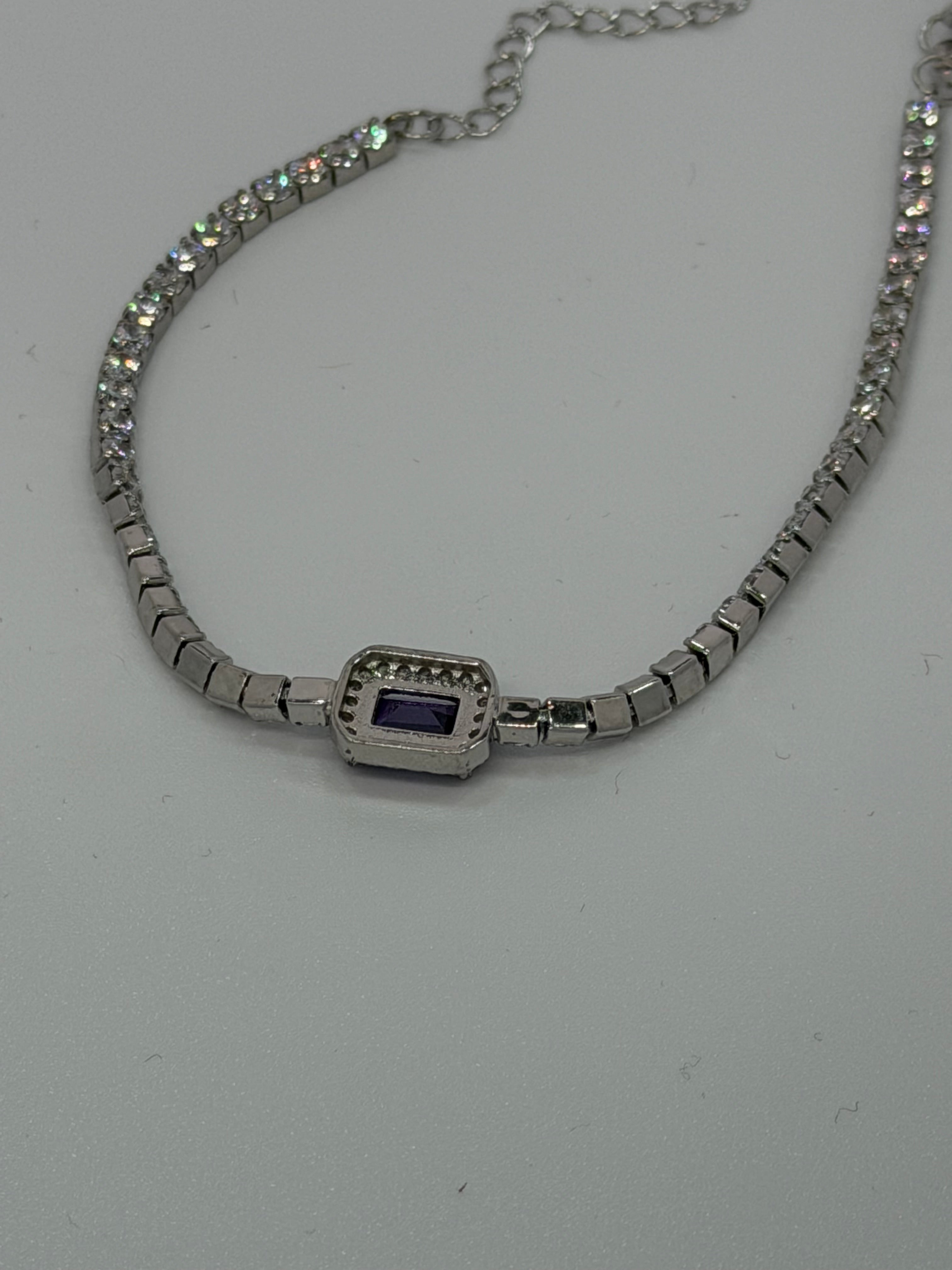 Bracciale Tennis Argento 925 con Pietra Viola Centrale – Semirigido